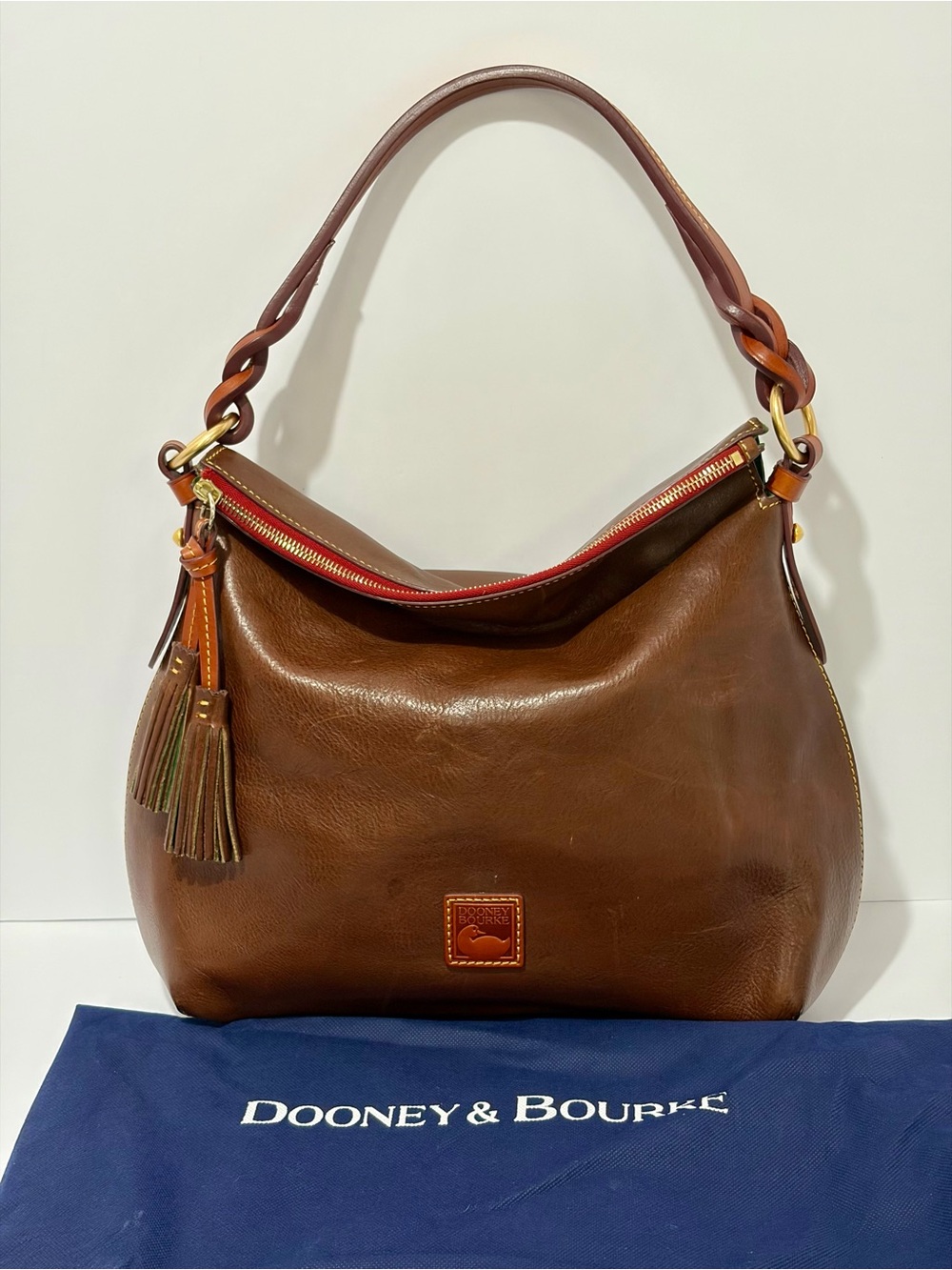 Dooney & Bourke Brown Leather Shoulder Bag with Red Trim